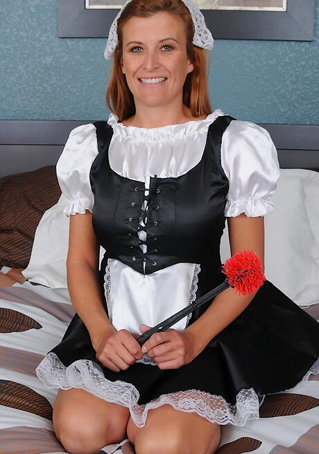 Stunning redheaded mature Anita Coxxx exposing big boobs and sissy 