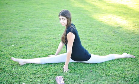 Sylphlike dark hair youthful Orianna in glasses denudes big boobs and pussy outside